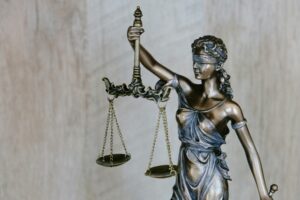 scale of justice representing litigation